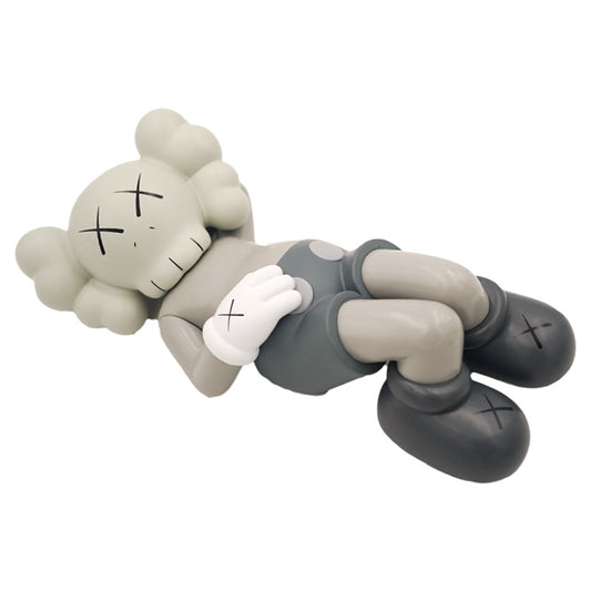 BRIAN LYING KAWS