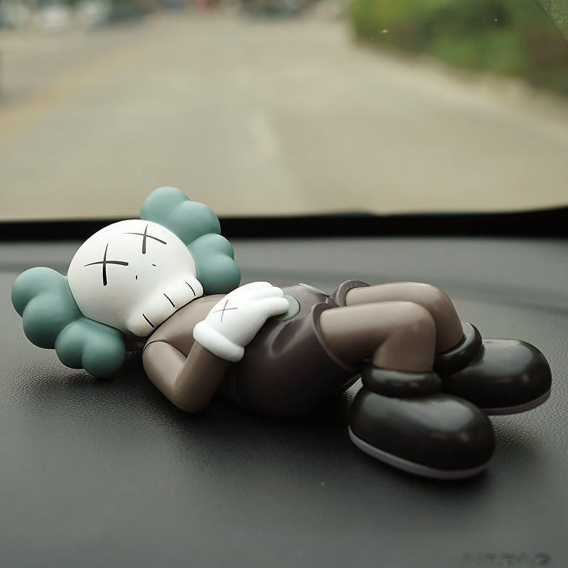 BRIAN LYING KAWS