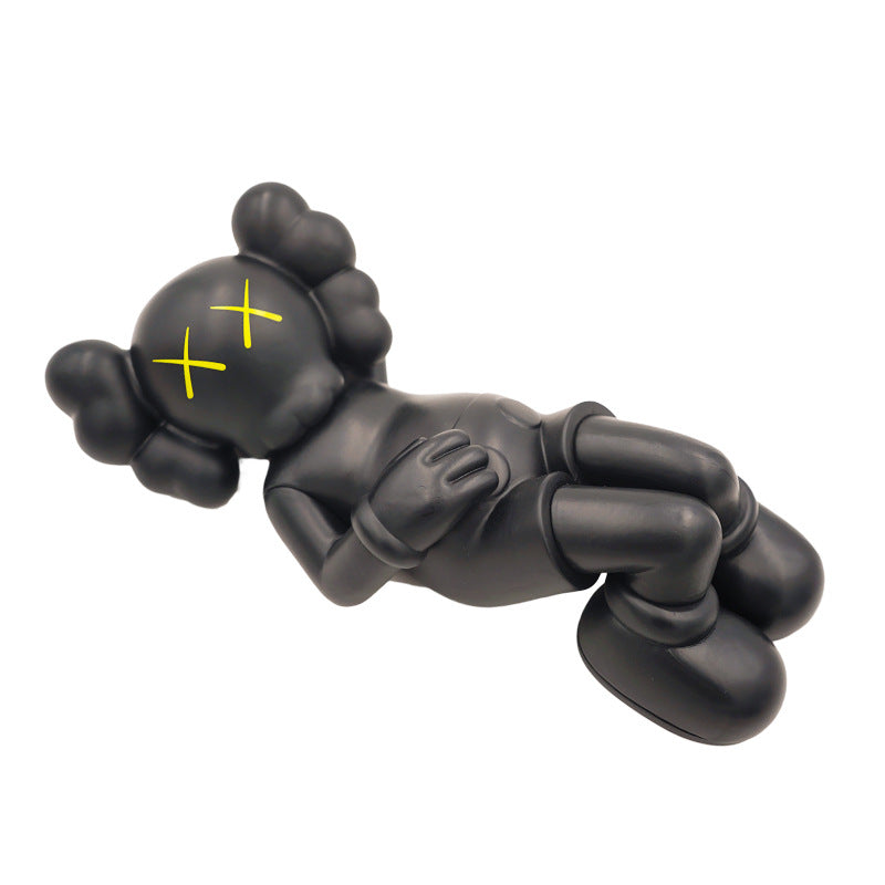 BRIAN LYING KAWS