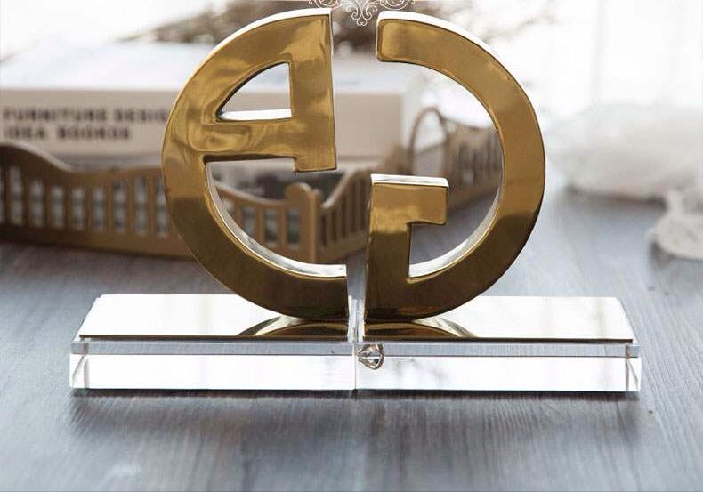 G Gold bookends