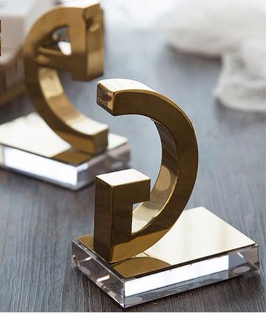 G Gold bookends