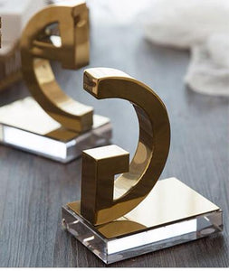 G Gold bookends