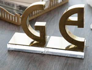 G Gold bookends