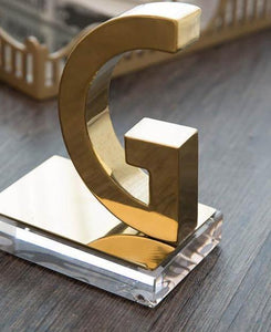 G Gold bookends