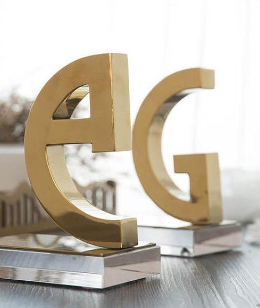 G Gold bookends